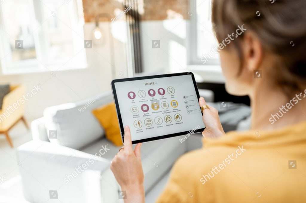 A LAdy looking at stats on a tablet